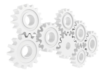 Cog wheel gear mechanism close-up. White background