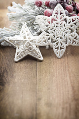 Christmas decoration over wooden background.