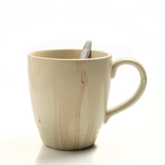 Used coffee cup isolated on white background