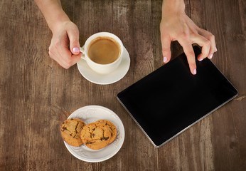 Woman hands with tablet computer