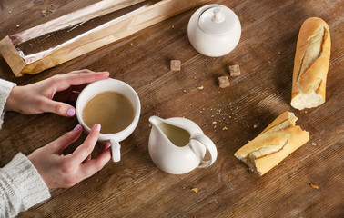 Woman Hand holding Coffee cup.