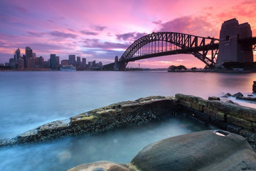 Naklejka premium Sydney panoramę miasta o zachodzie słońca