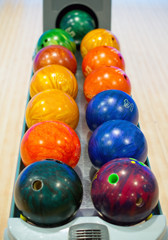 Fototapeta na wymiar Close-up view of balls in bowling club.