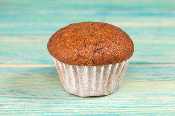 banana cup cake on wood deck .
