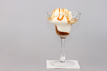 Vanilla ice cream with caramel syrup 
