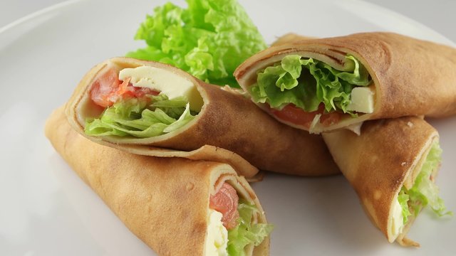 Pancakes (rolls) with salmon