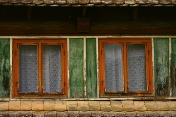 Colorful windows on old house