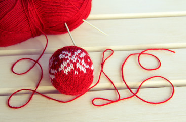 New Year's background with Christmas knitted ball