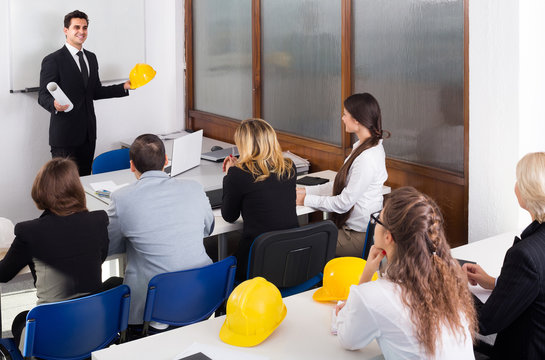 Architects Having Advanced Training Courses In Classroom
