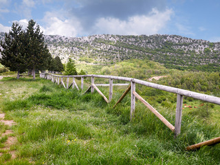 Mountain landscape with wooden fence