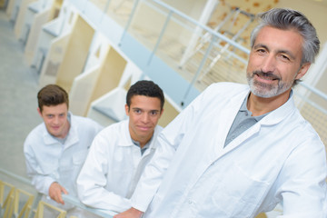 Fototapeta premium three men in white uniform