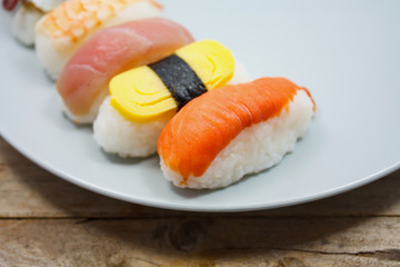 Maki Sushi set on wooden background