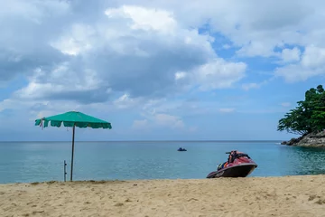 Foto op Canvas Jet ski on the beach and green umbrella in Phuket Thailand © aon_skynotlimit