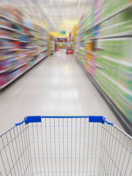 supermarket shelves aisle blurred background