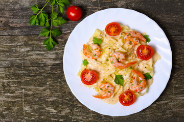 pasta with shrimp, tomatoes, herbs and cream sauce
