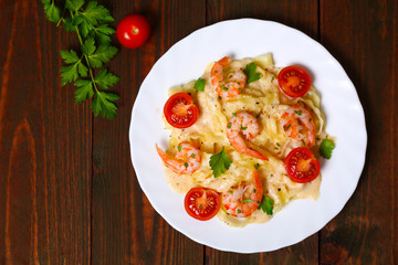 pasta with shrimp, tomatoes, herbs and cream sauce