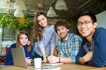 Group of modern businesspeople having a meeting in conference room