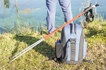 Backpack and nordic walking sticks