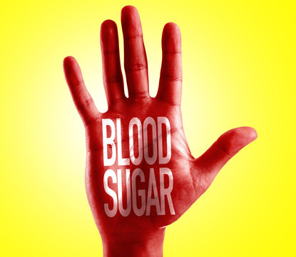 Blood Sugar written on hand with yellow background