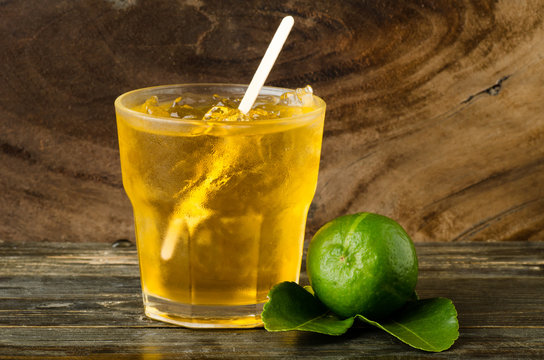 Ice lemon tea on wooden background