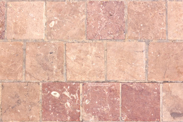 Red and brown floor tiles