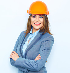 Arhcitect business woman standing against white wall with cross