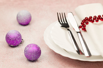 Christmas dinner table. Traditional Christmas decorations. Romantic table setting.