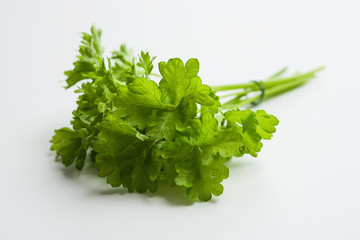 Fresh parsley on white