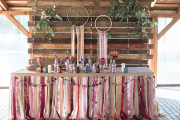 festive table for the bride and groom decorated 