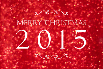 Merry christmas 2015 on red blur abstract bokeh background