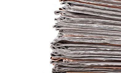 stack of daily newspapers