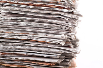 stack of daily newspapers