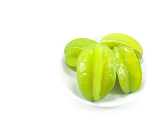 Star fruit in white container, Isolated white background.