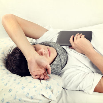 Man sleep with Tablet Computer