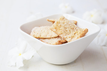 sliced wheat bread with butter and sugar