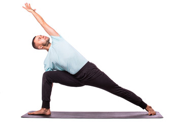Man is making yoga isolated over white background