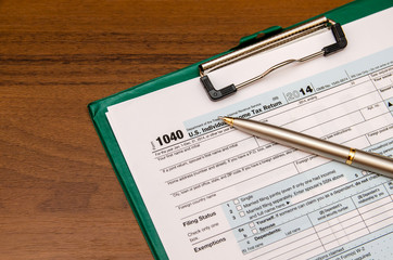 1040 tax return form  on wooden table