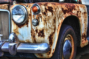 Old rusty vintage classic collectors car in need of restoration