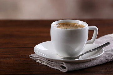 Cup of coffee on table close up