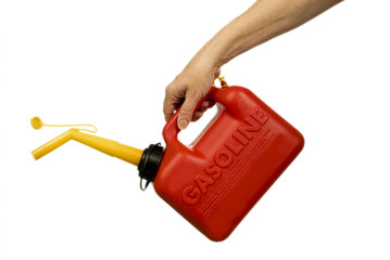 Horizontal shot of a hand holding a red gasoline or petrol container.  Isolated on white