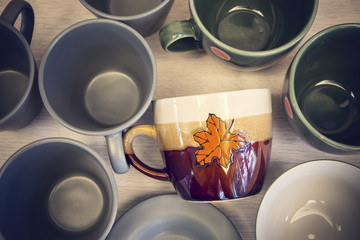 Christmas cup on wooden table with copy space.