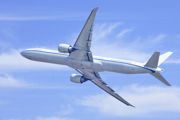 Passenger airplane climbing up in the air.