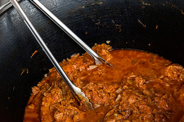 Cabbage cooked in a large pot