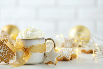 Beautiful composition with cup of cappuccino and Christmas cookies