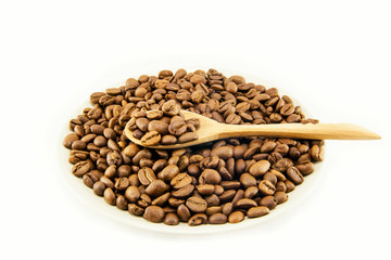 Cup full of coffee beans isolated