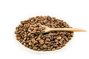 Cup full of coffee beans isolated