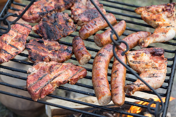 barbecue with delicious grilled meat on grill