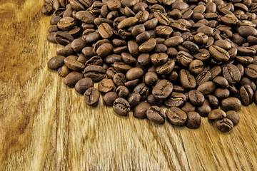 Coffee beans on vintage wooden board
