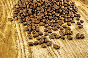 Coffee beans on vintage wooden board