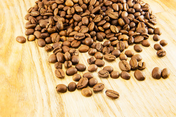 Coffee beans on vintage wooden board